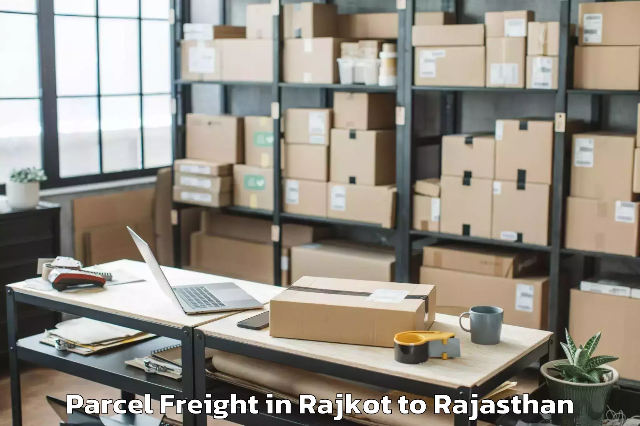 Professional Rajkot to Dholpur Parcel Freight